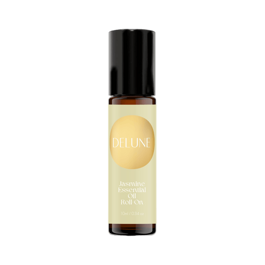 Delune Jasmine Essential Oil Roll-On in amber bottle with soothing floral aroma, mood-enhancing and playful scent, 10ml size.